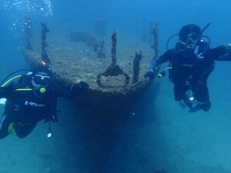 Scuba diver exploring coral reef in Kalpitiya Sri Lanka