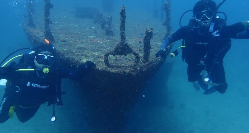 Scuba diver exploring coral reef in Kalpitiya Sri Lanka